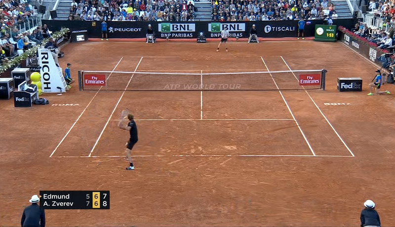 Zverev, in black, prepares for the drop shot
